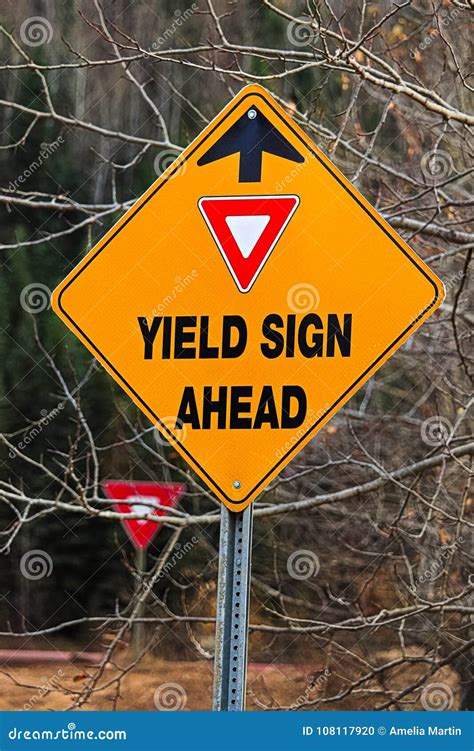 A Warning Yield Sign Ahead Sign In The Fall Stock Photo Download