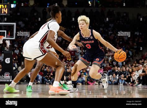 Auburn Guard Yuting Deng Right Drives Against South Carolina Forward