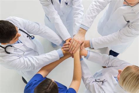 Group Of Doctors With Hands Together At Hospital In 2024 Aesthetic