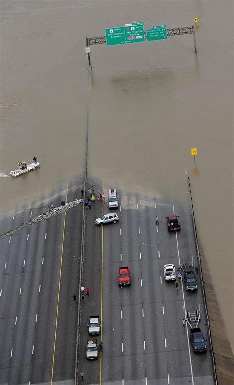 Harvey Flooded Vehicles Still On Roads Man Escapes From Houston