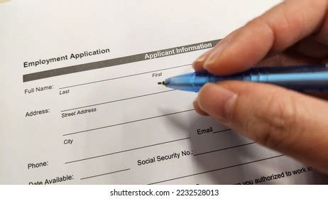 Job Seeker Filling Employment Application Form Stock Photo 2232528013