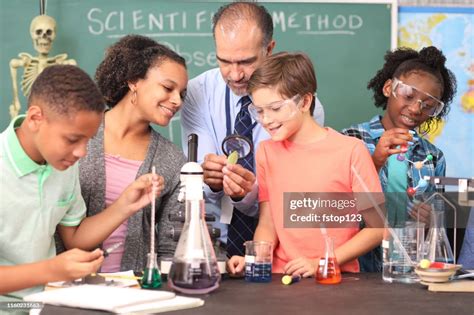 Junior High Age School Students Conduct Science Experiments In