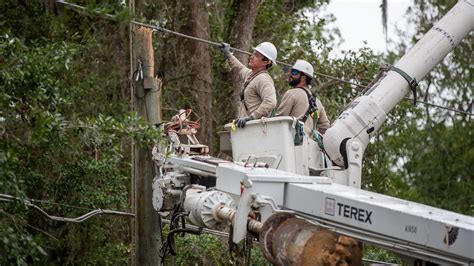 Linemen Crews Work To Restore Power In Tallahassee Following Tornadoes