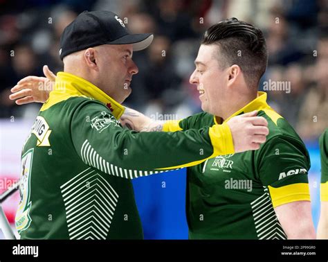 Northern Ontario S Darren Moulding Hugs Teammate Colin Hodgson After