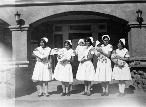 Nurses Holding Babies At The Sage Memorial Hospital At The Ganado