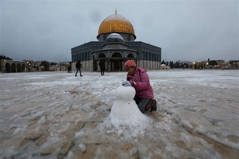 Snow In The Middle East Jerusalem S Holy Sites Appear Under A Layer Of