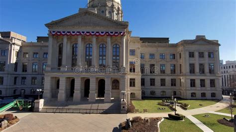 Tilt Shot Of The Georgia Capitol Museum With Statues And Lush Green